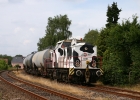 Am 31.7.06 springt die KUH kurzfristig als Aushilfslok ein und zieht hier gerade einen Kesselwagenzug am BÜ Hechelstraße.